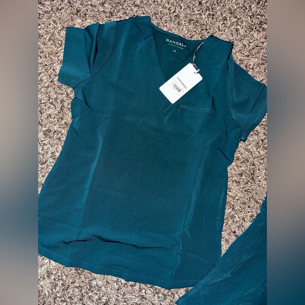 Mandala Scrub Tops. Brand new with tags! Never worn. Size XS. Carribbean Blue